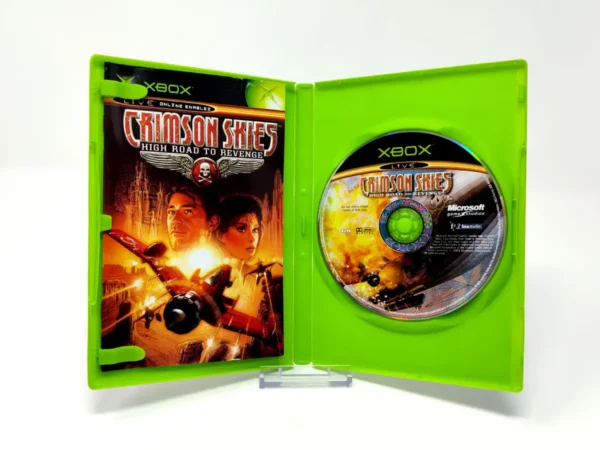 Interior del juego Crimson Skies: High Road to Revenge (UK) para XBOX con disco y manual