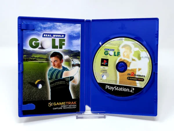 Interior del juego Real World Golf (UK) para PlayStation 2 con disco y manual