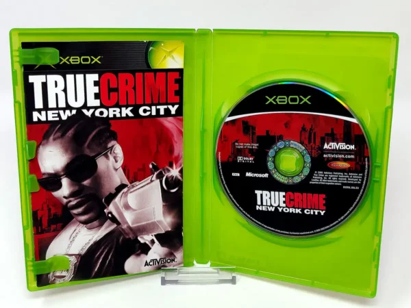 Interior del juego True Crime: New York City (FRA) para XBOX con disco y manual