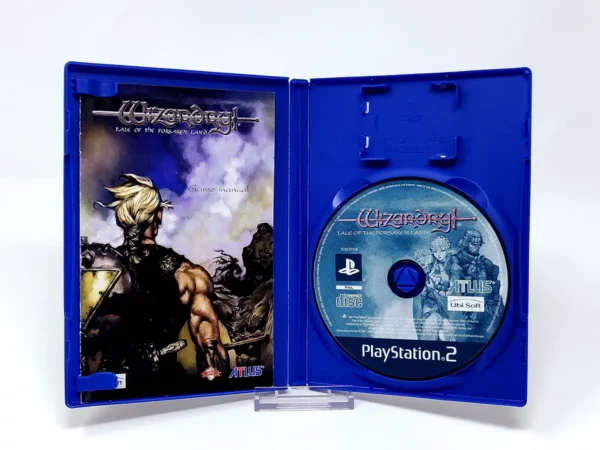 Interior del juego Wizardry: Tale of the Forsaken Land (UK) para PlayStation 2 con disco y manual