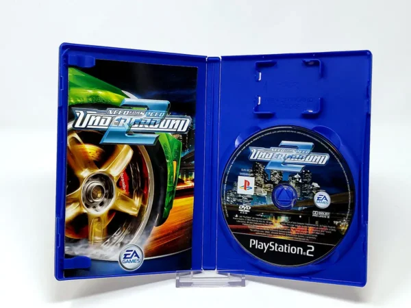 Interior del juego Need for Speed: Underground 2 (ESP) para PlayStation 2 con disco y manual