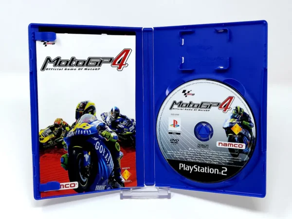 Interior del juego MotoGP 4 (ESP) para PlayStation 2 con disco y manual