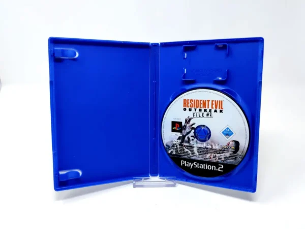Interior del juego Resident Evil: Outbreak: File #2 (ESP) (Rebajado) para PlayStation 2 con disco y manual