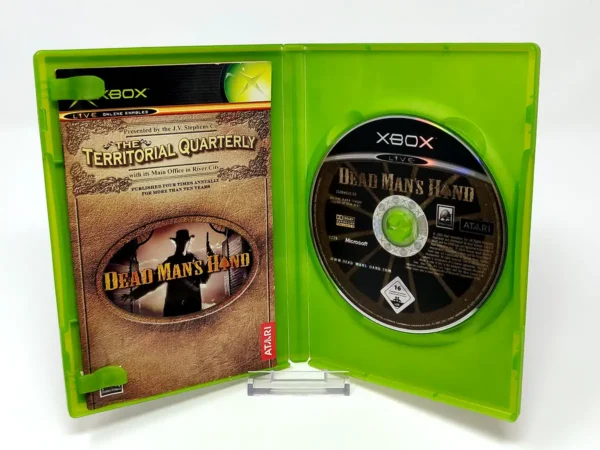 Interior del juego Dead Man's Hand (ESP) para XBOX con disco y manual