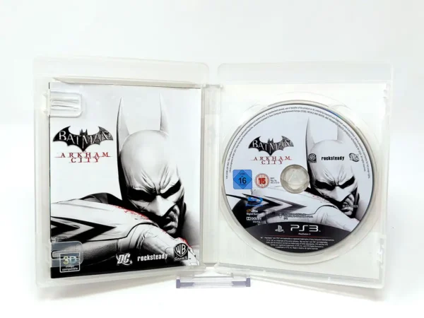 Interior del juego Batman: Arkham City (ESP) para PlayStation 3 con disco y manual