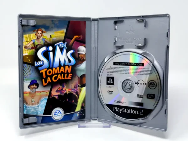 Interior del juego Los Sims: Toman la Calle (ESP) (Platinum) para PlayStation 2 con disco y manual
