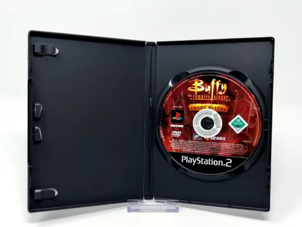 Interior del juego Buffy the Vampire Slayer: Chaos Bleeds (ESP) (Rebajado) para PlayStation 2 con disco y manual