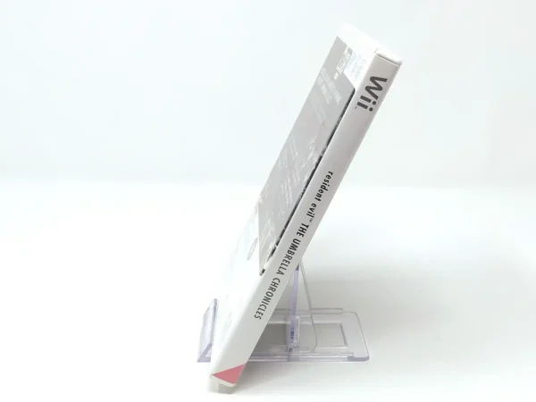 Lateral de la caja de Resident Evil: The Umbrella Chronicles (ESP) para Nintendo Wii
