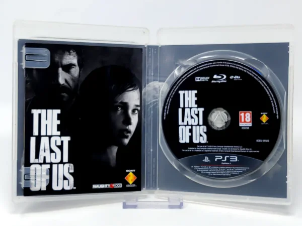 Interior del juego The Last of Us (UK) para PlayStation 3 con disco y manual