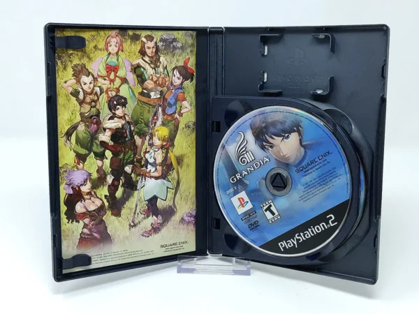 Interior del juego Grandia III (USA) para PlayStation 2 con disco y manual