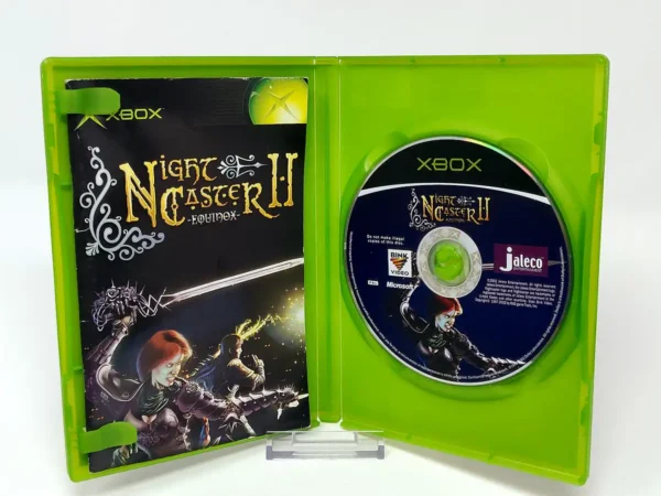 Interior del juego Night Caster II: Equinox (UK) para XBOX con disco y manual