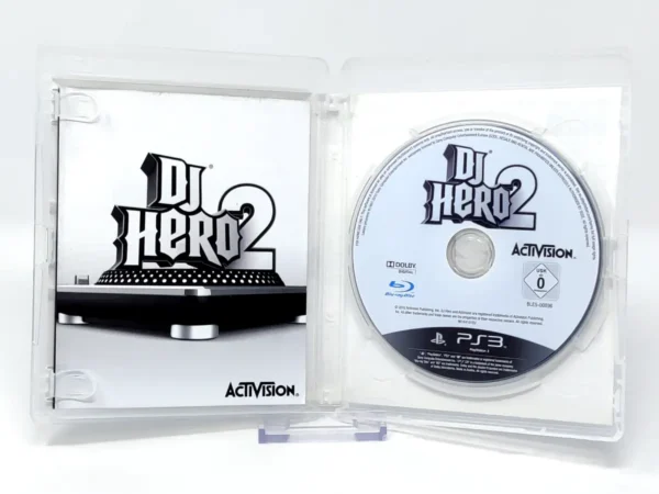 Interior del juego DJ Hero 2 (EUR) (Rebajado) para PlayStation 3 con disco y manual