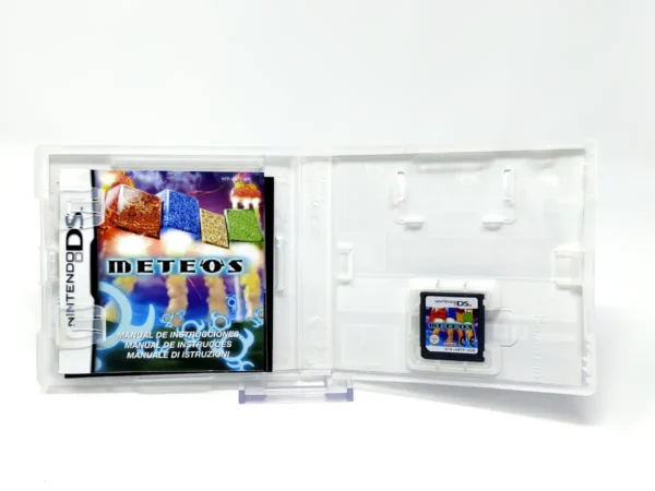 Interior del juego Meteos (ESP) para Nintendo DS con disco y manual