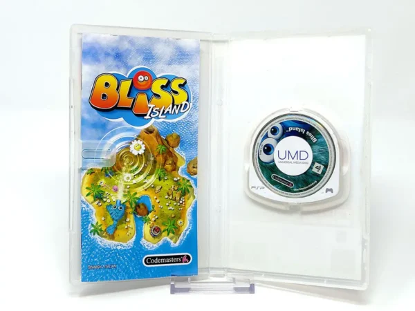 Interior del juego Bliss Island (ESP) para PSP con disco y manual