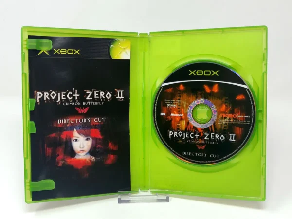 Interior del juego Project Zero II: Crimson Butterfly: Director's Cut (ESP) para XBOX con disco y manual