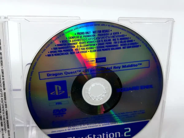 Interior del juego Dragon Quest: El Periplo del Rey Maldito (ESP) (Promo) para PlayStation 2 con disco y manual