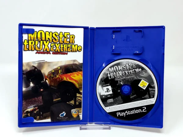 Interior del juego Monster Trux Extreme: Arena Edition (POR) para PlayStation 2 con disco y manual