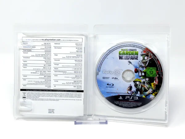 Interior del juego Plants vs. Zombies: Garden Warfare (ESP) para PlayStation 3 con disco y manual
