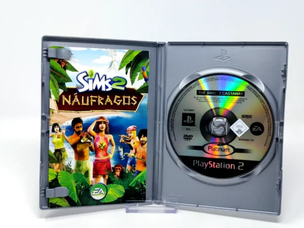Interior del juego Los Sims 2: Náufragos (ESP) (Platinum) para PlayStation 2 con disco y manual