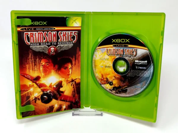 Interior del juego Crimson Skies: High Road to Revenge (ESP) para XBOX con disco y manual
