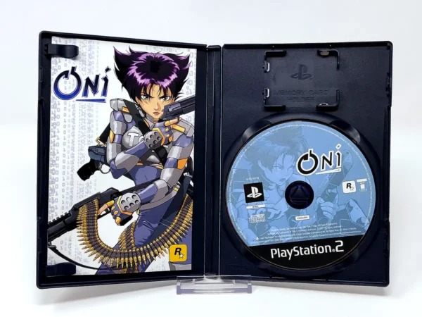 Interior del juego Oni (UK) para PlayStation 2 con disco y manual