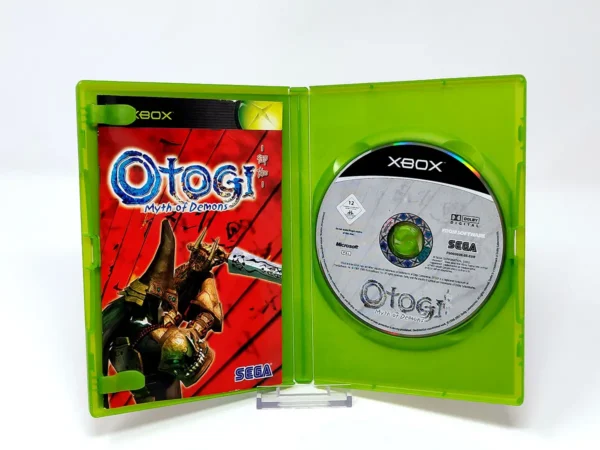 Interior del juego Otogi: Myth of Demons (ESP) para XBOX con disco y manual