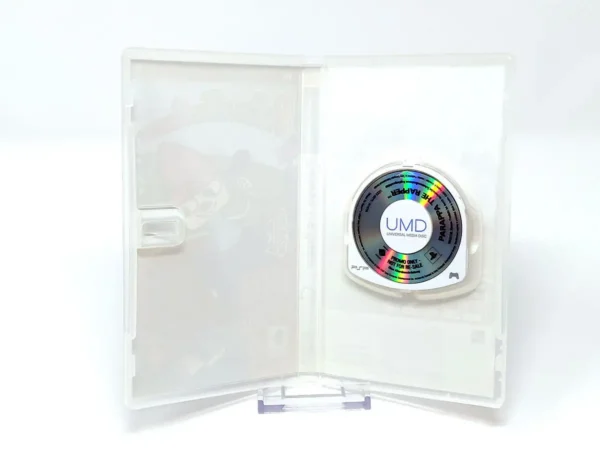 Interior del juego PaRappa the Rapper (ESP) (Promo) para PSP con disco y manual