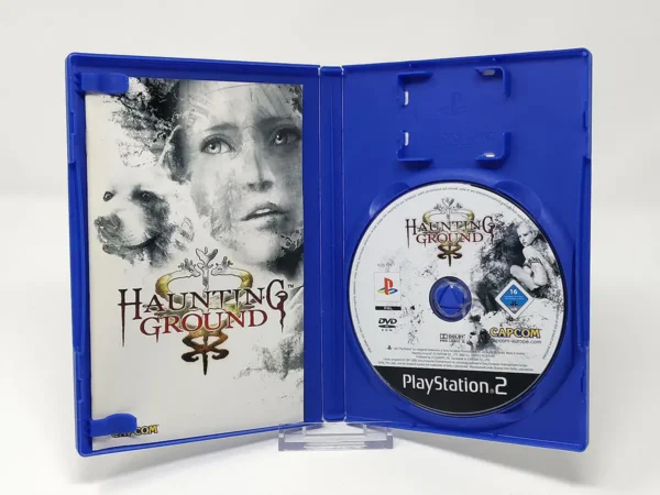 Interior del juego Haunting Ground (ESP) para PlayStation 2 con disco y manual