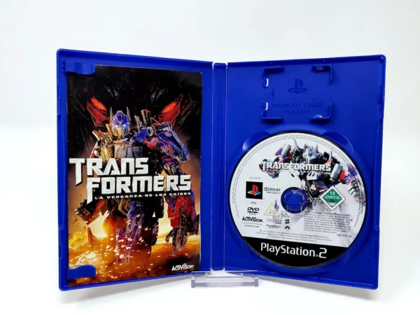 Interior del juego Transformers: La Venganza de los Caídos (ESP) para PlayStation 2 con disco y manual