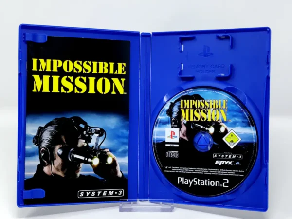 Interior del juego Impossible Mission (FRA) para PlayStation 2 con disco y manual