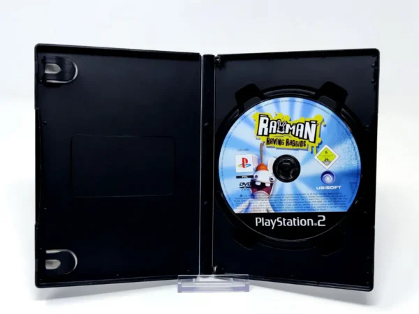 Interior del juego Rayman: Raving Rabbids (ESP) (Rebajado) para PlayStation 2 con disco y manual