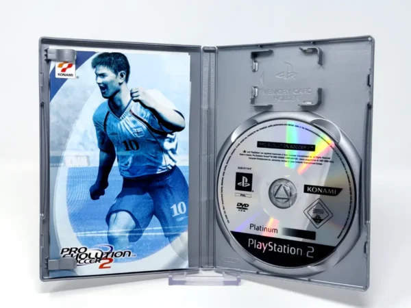 Interior del juego Pro Evolution Soccer 2 (ESP) (Platinum) para PlayStation 2 con disco y manual