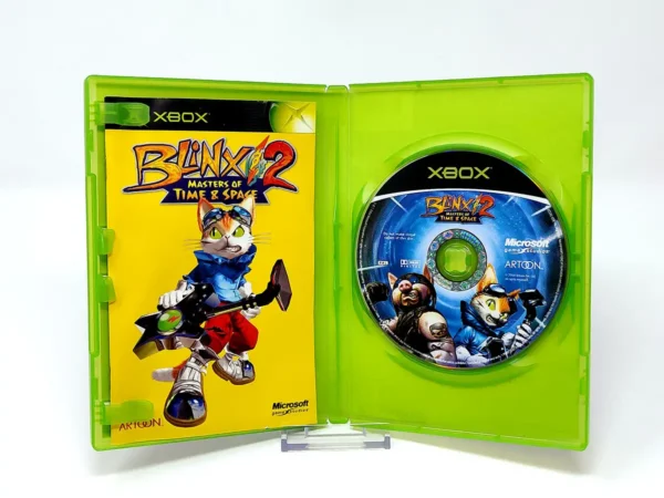 Interior del juego Blinx 2: Masters of Time & Space (ESP) para XBOX con disco y manual