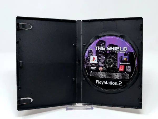 Interior del juego The Shield: The Game (ESP) (Rebajado) para PlayStation 2 con disco y manual