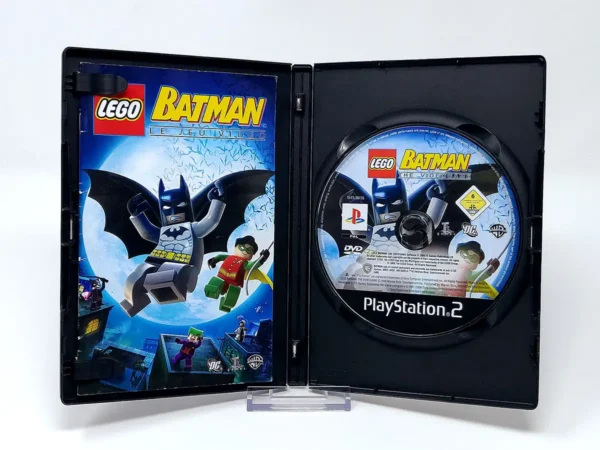 Interior del juego LEGO Batman: Le Jeu Video (FRA) para PlayStation 2 con disco y manual
