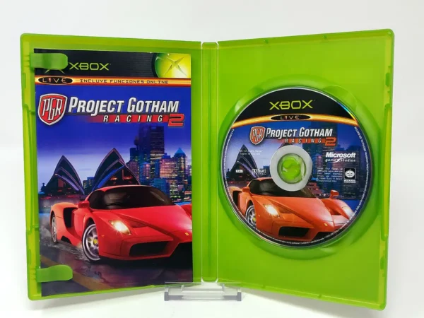 Interior del juego Project Gotham Racing 2 (ESP) para XBOX con disco y manual