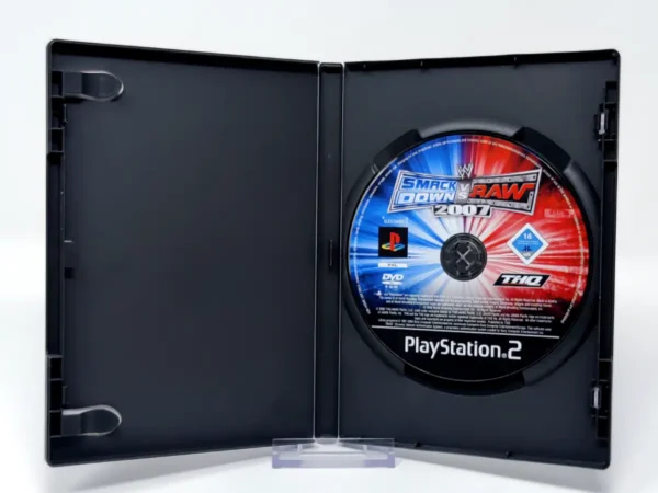 Interior del juego WWE SmackDown vs. Raw 2007 (ESP) (Rebajado) para PlayStation 2 con disco y manual