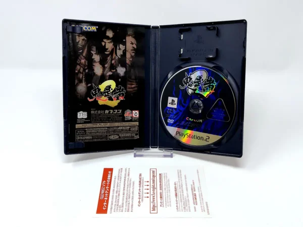 Interior del juego Onimusha 2: Samurai's Destiny (JAP) para PlayStation 2 con disco y manual