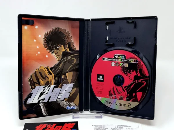 Interior del juego Sega Ages 2500 Series Vol. 11: Hokuto no Ken (JAP) para PlayStation 2 con disco y manual