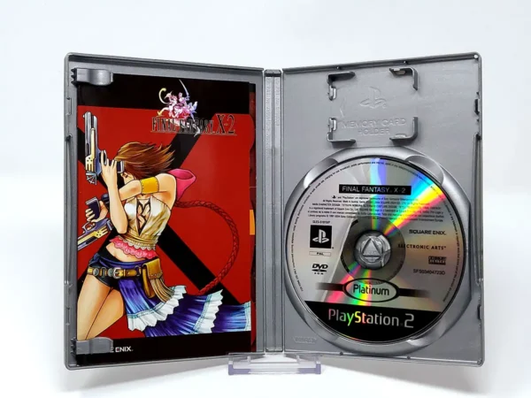 Interior del juego Final Fantasy X-2 (ESP) (Platinum) para PlayStation 2 con disco y manual