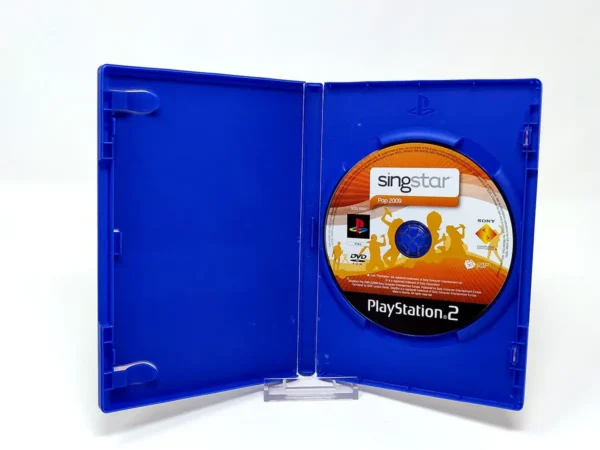Interior del juego SingStar Pop 2009 (ESP) (Rebajado) para PlayStation 2 con disco y manual