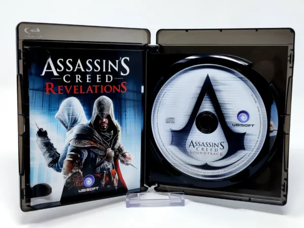 Interior del juego Assassin's Creed: Revelations (Edición Especial) (ESP) para PlayStation 3 con disco y manual