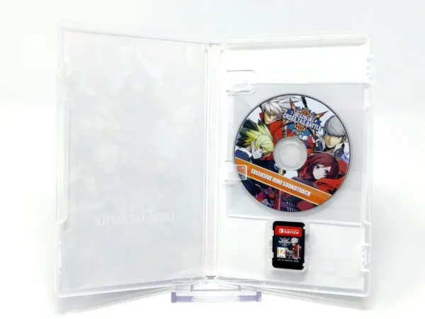 Interior del juego BlazBlue: Cross Tag Battle (ESP) para Nintendo Switch con disco y manual