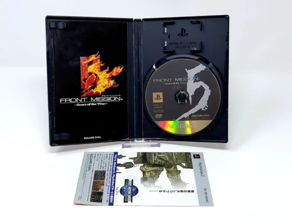 Interior del juego Front Mission 5: Scars of the War (JAP) para PlayStation 2 con disco y manual