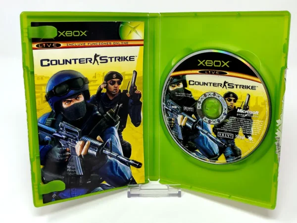Interior del juego Counter-Strike (ESP) para XBOX con disco y manual