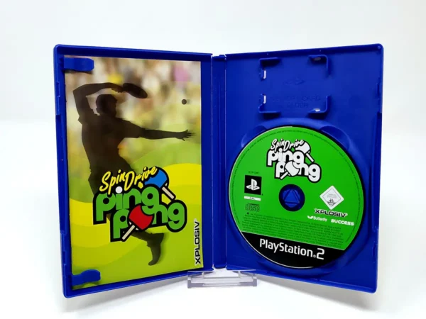 Interior del juego SpinDrive Ping Pong (UK) para PlayStation 2 con disco y manual