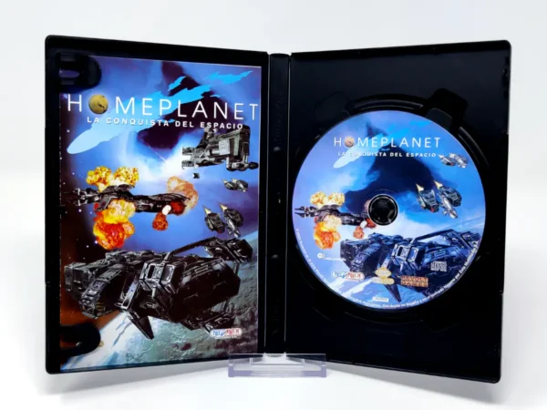 Interior del juego Homeplanet (ESP) para PC con disco y manual