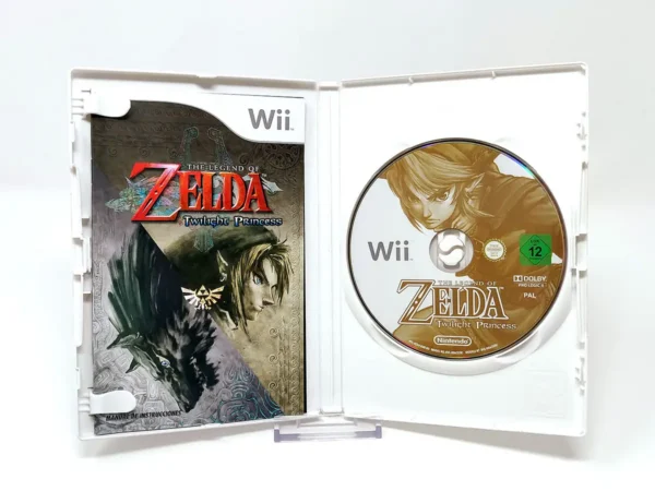 Interior del juego The Legend of Zelda: Twilight Princess (ESP) (Nintendo Selects) para Nintendo Wii con disco y manual
