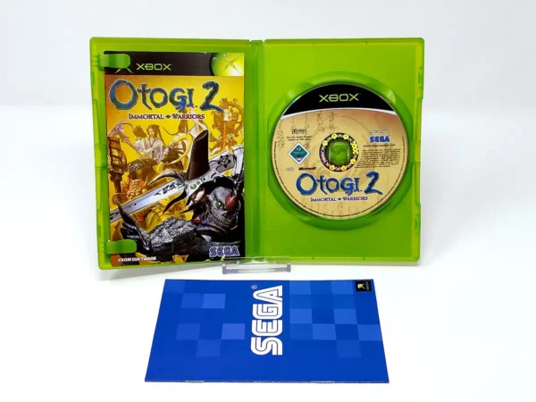 Interior del juego Otogi 2: Immortal Warriors (ESP) para XBOX con disco y manual