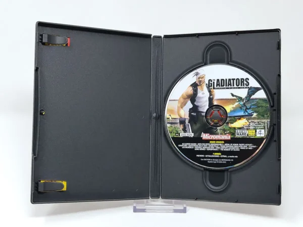Interior del juego The Gladiators: Galactic Circus Games (ESP) para PC con disco y manual
